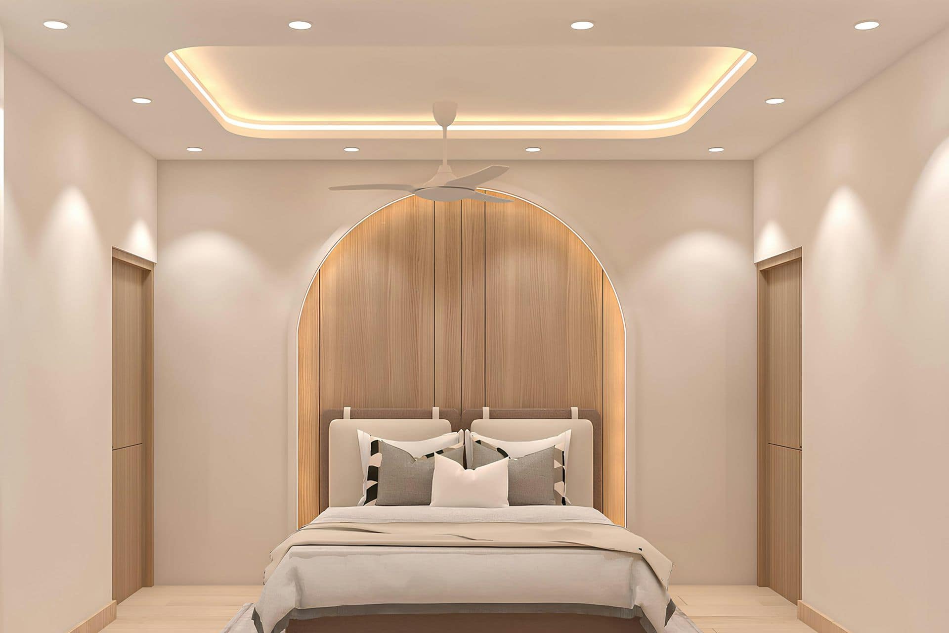 Bedroom with glowing cove-lit gypsum false ceiling, recessed spotlights, ceiling fan and arched wood-panel headboard wall