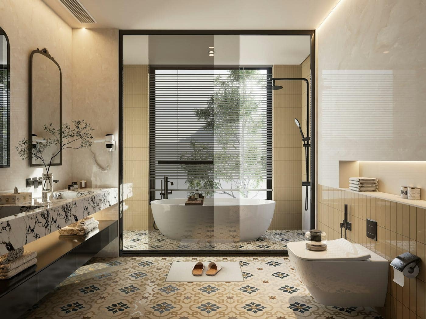 Bathroom with marble vanity counter, arched mirrors, glass-enclosed freestanding tub and patterned floor tiles