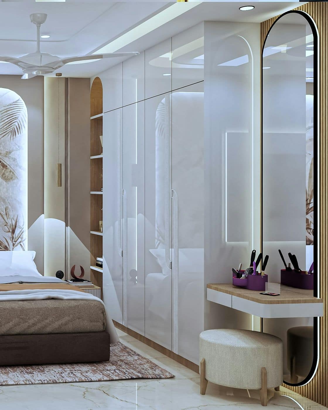 Glossy white wardrobe shutters with profile lighting beside an arched mirror and dressing table in a bedroom